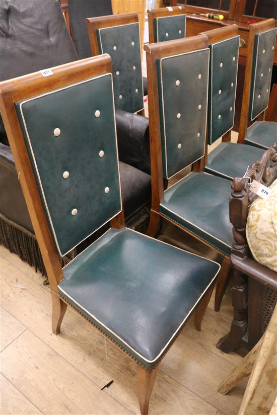 A set of six dining chairs, with buttoned green leatherette upholstery
